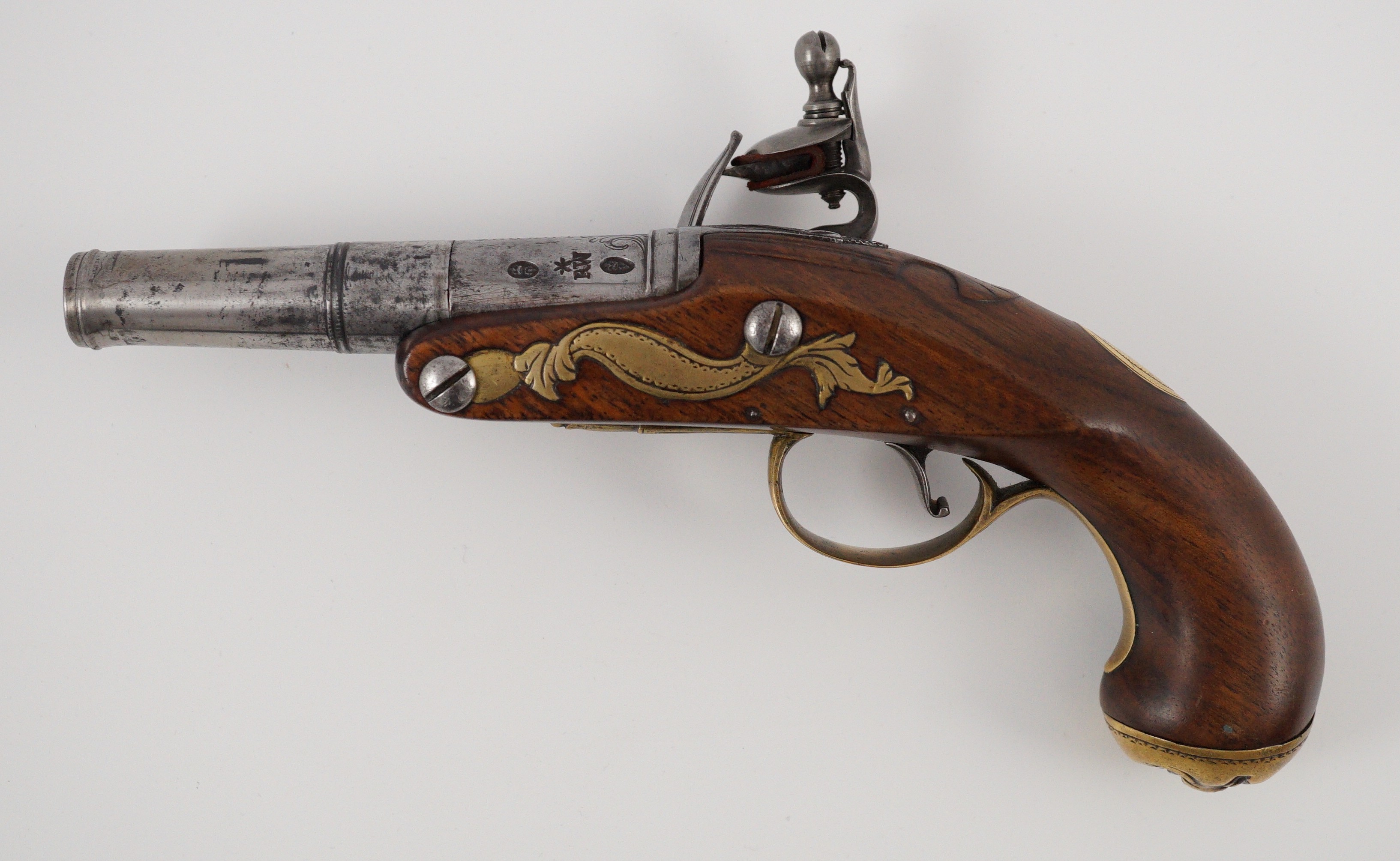 Wilson of London. An early 18th century flintlock pocket pistol, 11cm high 19cm long